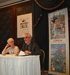 Steven Shrybman and Dr. Sally Mahood address the media at press conference in Regina, Saskatchewan. 